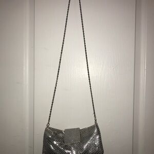 Silver Clutch with Sleek Design and Wristlet
